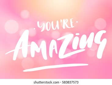 Phrase You're Amazing. Brush pen lettering. Vector Illustration isolated on a abstract blurred background.