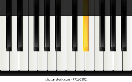 Piano keyboard with a gold key