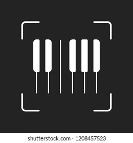 Piano keyboard icon. Horizontal view. White object in camera autofocus on dark background