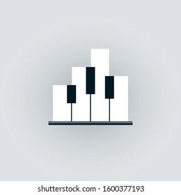 Piano keyboard symbol with abstract buildings shape. Music and city concept design.