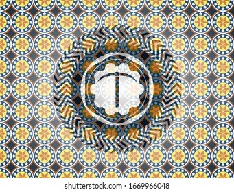 pickaxe icon inside arabic badge. Arabesque decoration.