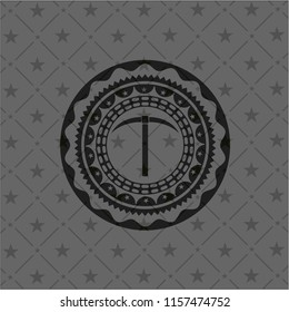 pickaxe icon inside black emblem