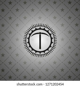 pickaxe icon inside black emblem