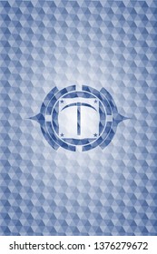 pickaxe icon inside blue emblem with geometric pattern.