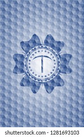 pickaxe icon inside blue polygonal emblem.