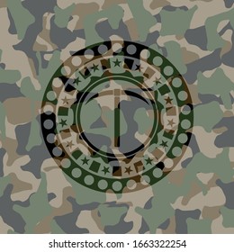 icono del pickaxe dentro del emblema del camuflaje