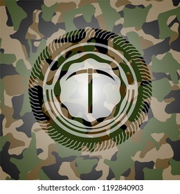 pickaxe icon inside camouflage texture