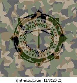 pickaxe icon inside camouflaged emblem