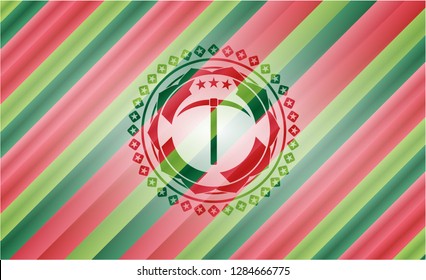 pickaxe icon inside christmas colors badge.