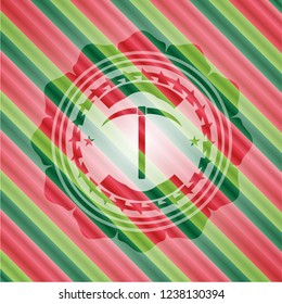 pickaxe icon inside christmas emblem.