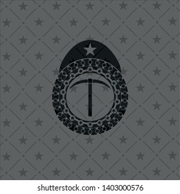 pickaxe icon inside dark badge or emblem