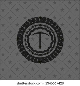 pickaxe icon inside dark emblem