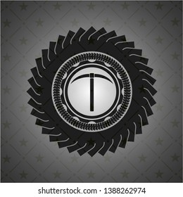 pickaxe icon inside dark emblem