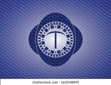 pickaxe icon inside denim background