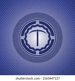 pickaxe icon inside emblem with denim high quality background