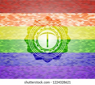 pickaxe icon inside emblem on mosaic background with the colors of the LGBT flag