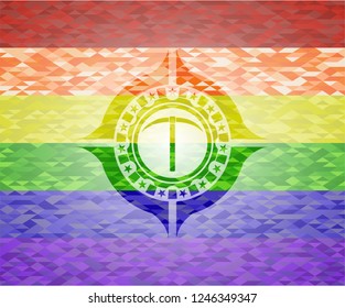 pickaxe icon inside emblem on mosaic background with the colors of the LGBT flag