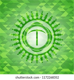 pickaxe icon inside green emblem with mosaic ecological style background