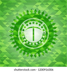pickaxe icon inside green emblem. Mosaic background