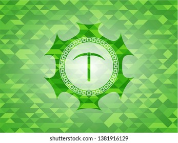 pickaxe icon inside green emblem with mosaic ecological style background