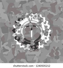 pickaxe icon inside grey camo texture