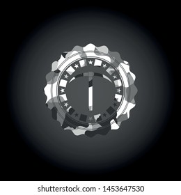 pickaxe icon inside grey camouflage emblem