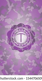 pickaxe icon inside pink camouflage emblem