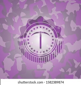 pickaxe icon inside pink and purple camouflage emblem