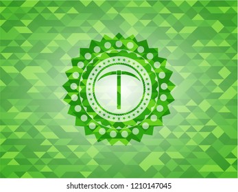 pickaxe icon inside realistic green mosaic emblem