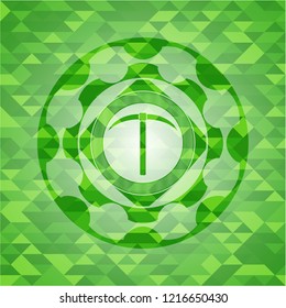 pickaxe icon inside realistic green mosaic emblem