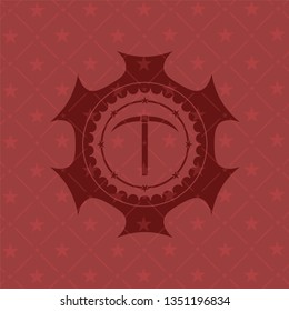 pickaxe icon inside red emblem