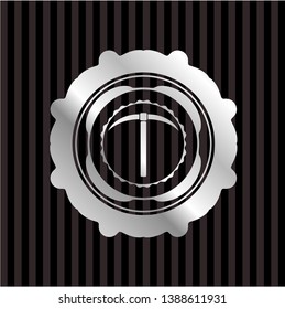 pickaxe icon inside silver badge