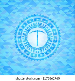 pickaxe icon inside sky blue mosaic emblem