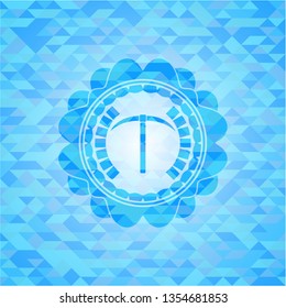 pickaxe icon inside sky blue emblem with mosaic ecological style background
