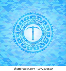 pickaxe icon inside sky blue emblem. Mosaic background