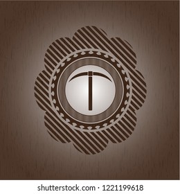 pickaxe icon inside vintage wood emblem
