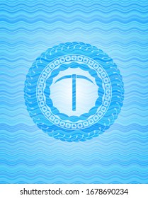 pickaxe icon inside water emblem background.