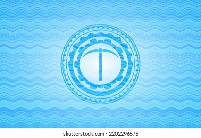 Pickaxe Icon Inside Water Representation Emblem. 