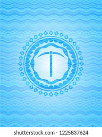pickaxe icon inside water wave concept badge.