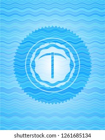pickaxe icon inside water wave concept badge.