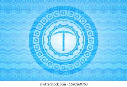pickaxe icon inside water wave representation badge.