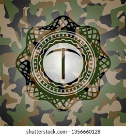 pickaxe icon on camouflaged pattern