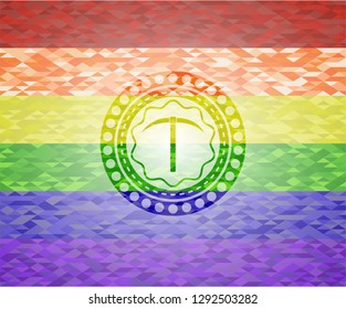 pickaxe icon on mosaic background with the colors of the LGBT flag