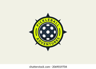 pickleball Adventure logo with a combination of ball and compass