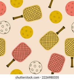 Pickleball with a ball and a rackets seamless pattern. Vector background for sport design, fabric, wrapping paper and textile.