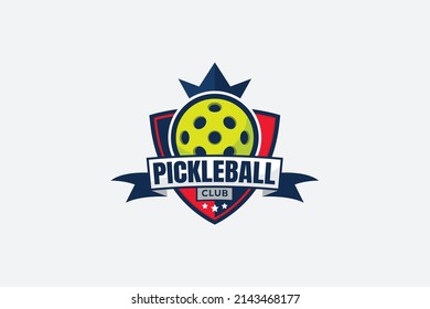 pickleball club logo with a ball, crown, shield, stars, and ribbon.