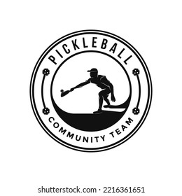 Pickleball emblem logo with a silhouette of a man playing pickleball.