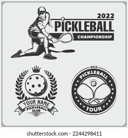 Pickleball labels, emblems, badges, design elements and silhouette of player. Black and white.