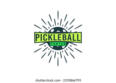 pickleball logo with a combination of a ball for pickleball and sparks.