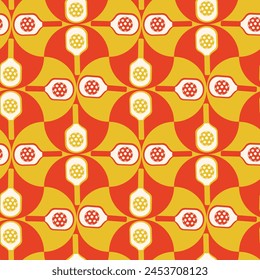 Pickleball paddles on yellow and red scallop shapes seamless pattern. For textile, fabric and wrapping paper.